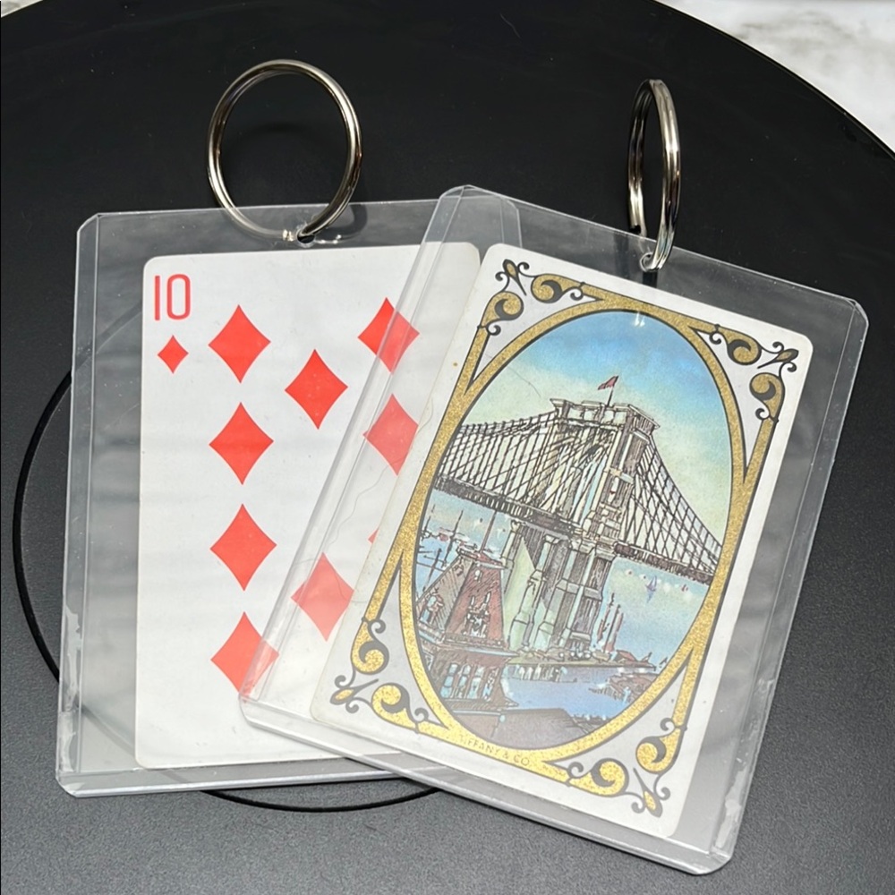 TIFFANY & CO.VINTAGE PLAYING CARD KEYCHAIN/ BAG CHARM.♦️SUIT BROOKLYN BRIDGE - Picture 1 of 8